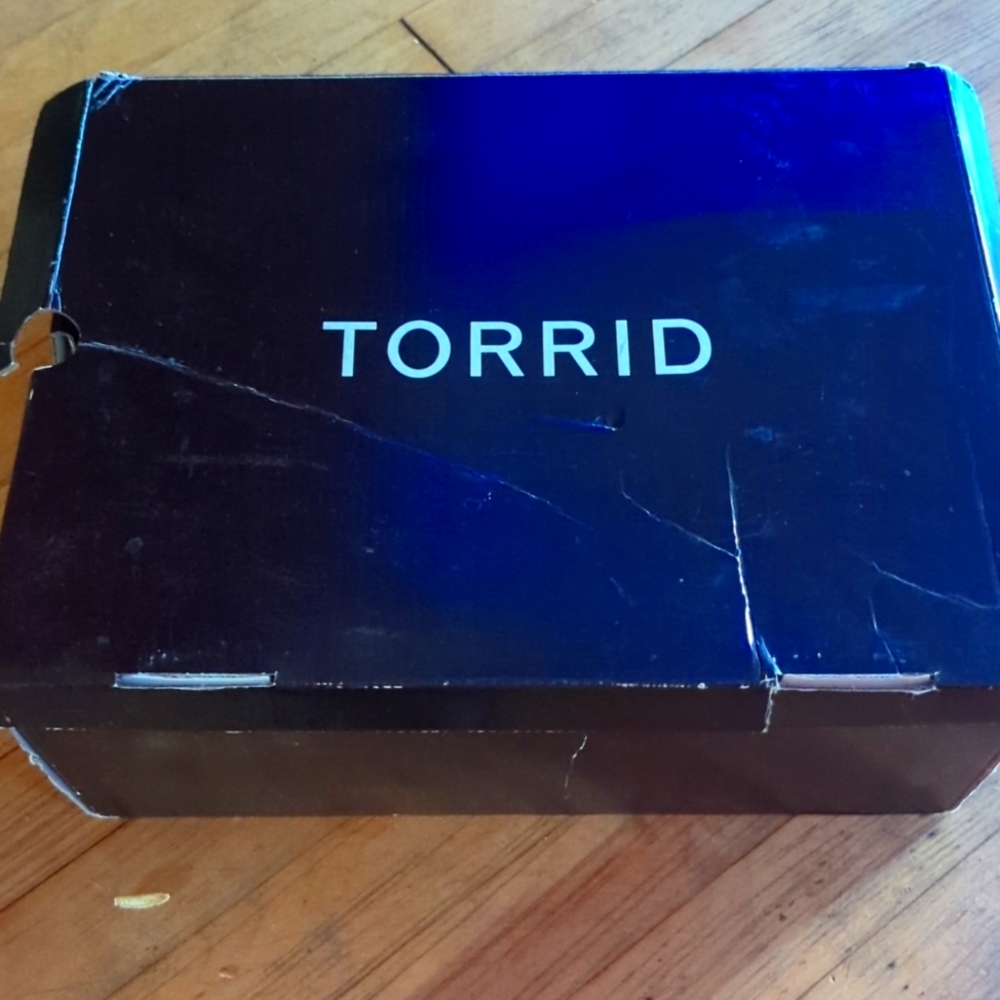 Black knee high heeled boots